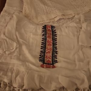 A cute shirt with pattern on front